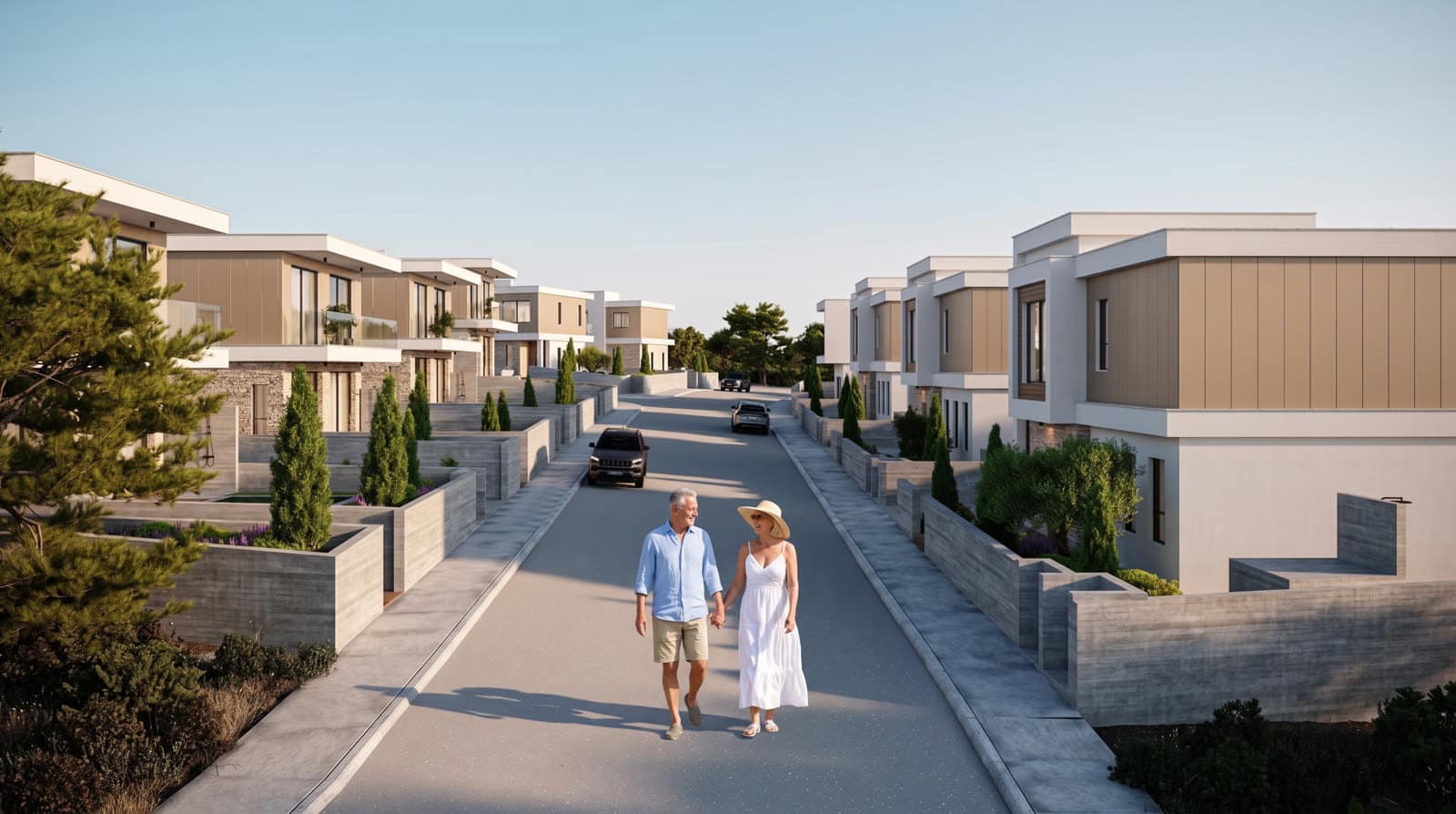 Paar spaziert durch eine neue Wohnstraße mit Villen auf Zypern